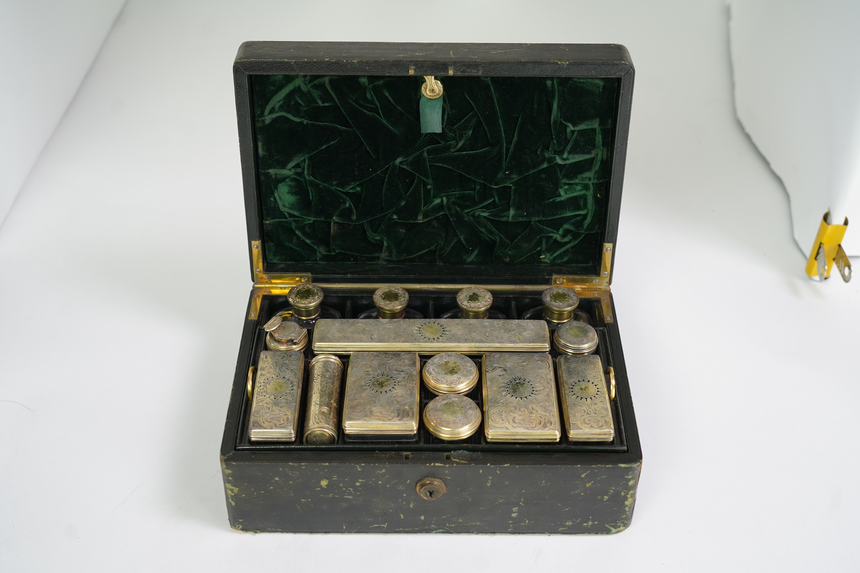 A gentleman's William IV gilt tooled leather travelling toilet case, by 'Edwards, Manufacturer to His Majesty, 21 Kings Street, Bloomsbury, London,'